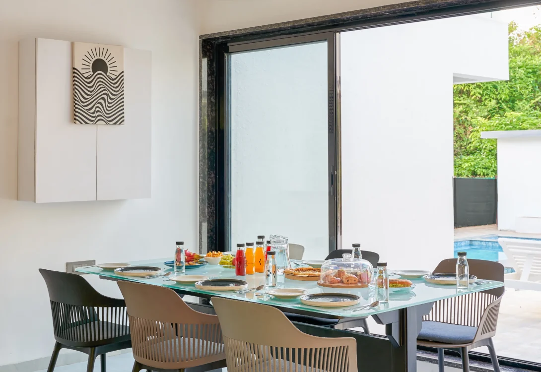 Dining area setup for group meals in a 4BHK villa in Alibag