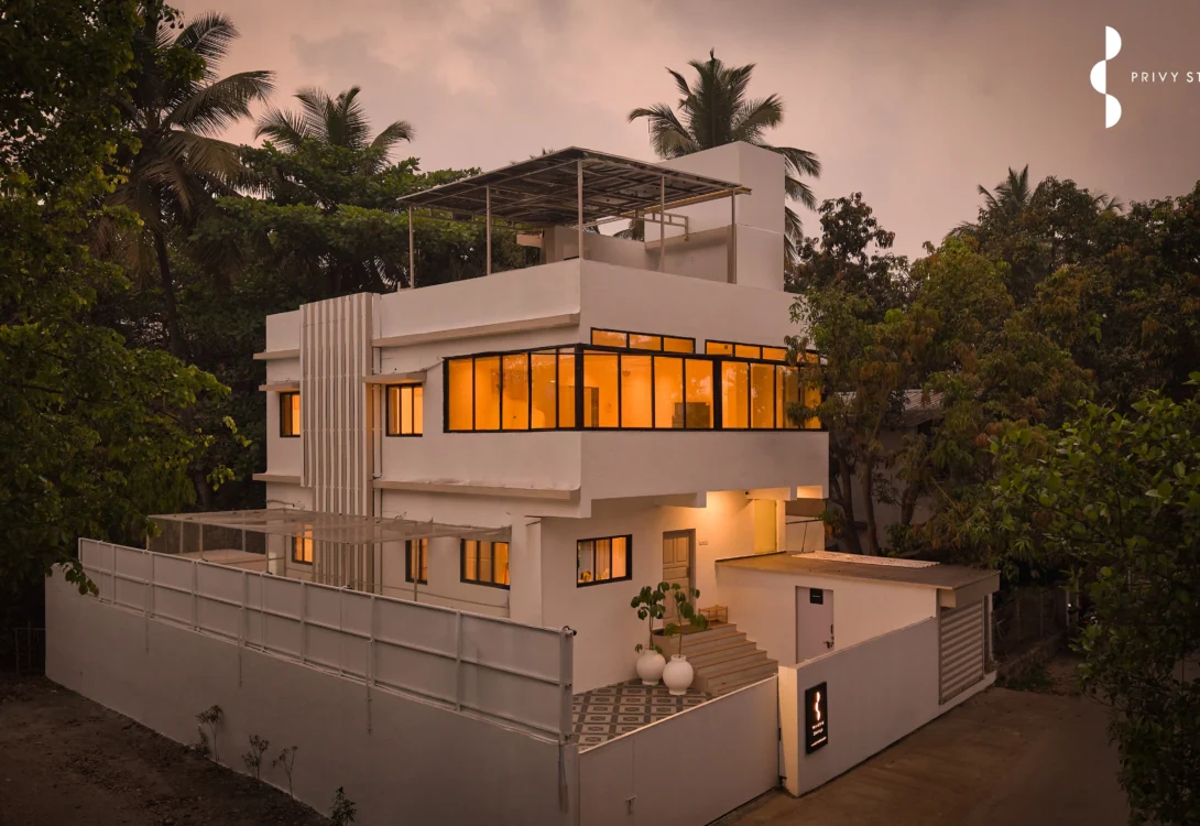 Exterior view of a modern private pool villa in Alibag surrounded by greenery-Ziva Vila