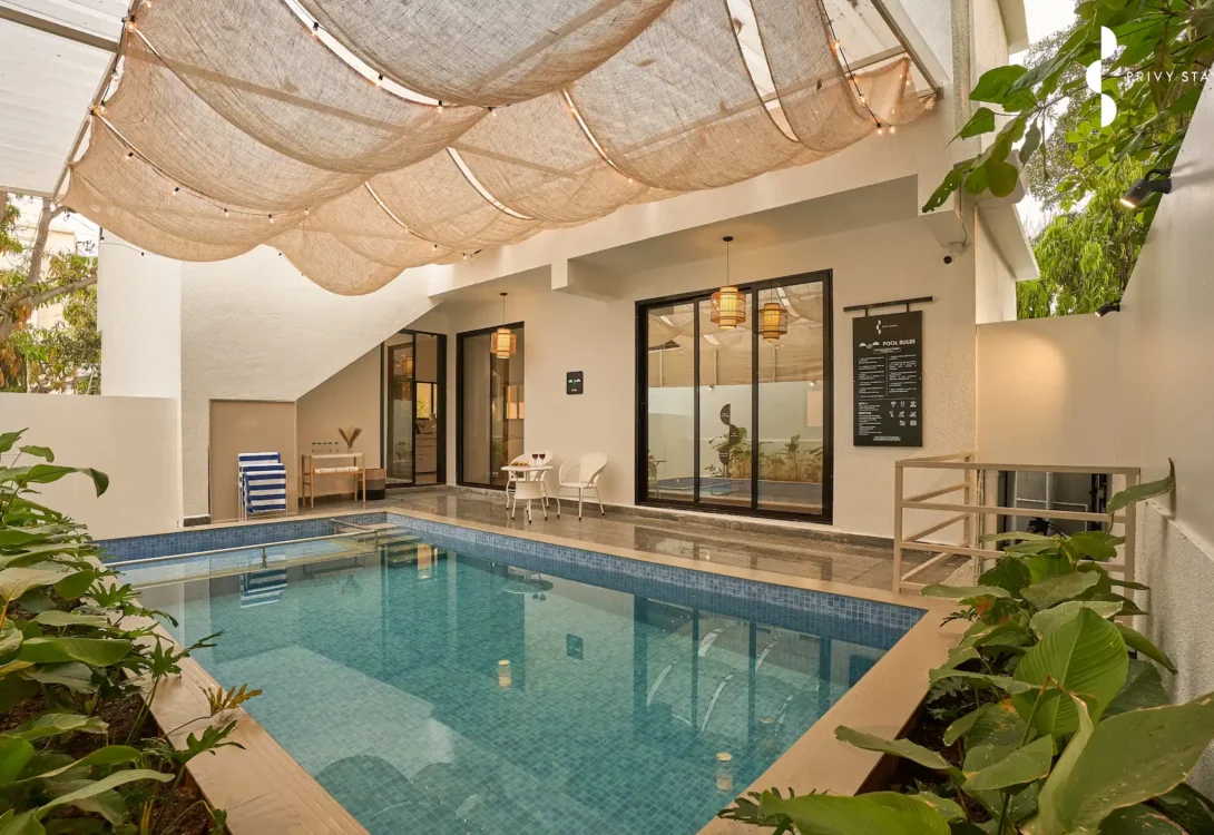 Outdoor pool area with seating at a private villa near Varsoli Beach